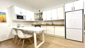 Fridge, microwave, oven, coffee/tea maker