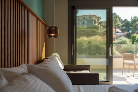 Junior Room, 1 Queen Bed with Sofa bed, Balcony | In-room safe, desk, free WiFi, bed sheets. HP Family Suites