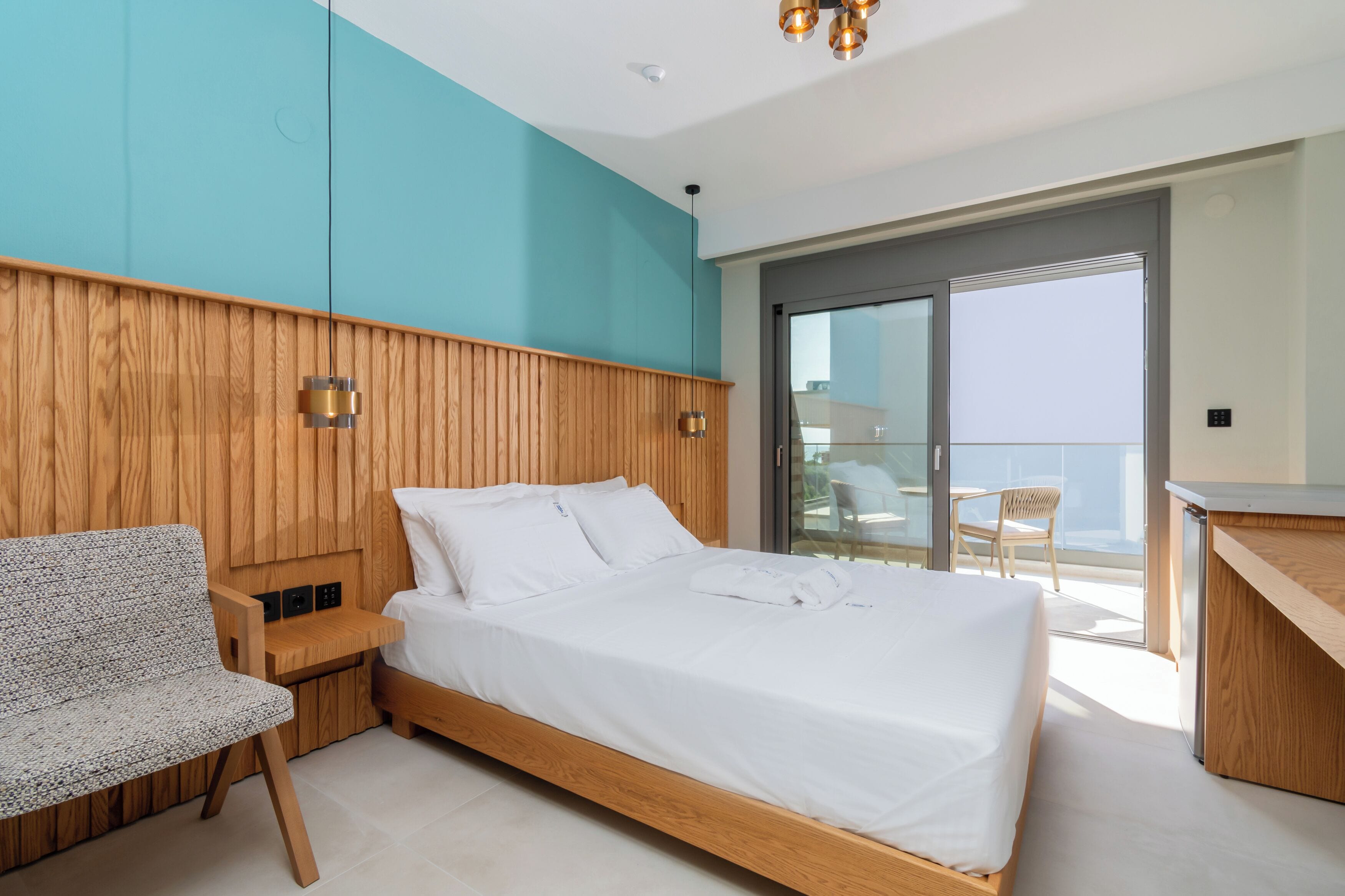 Junior Room, 1 Queen Bed, Balcony, Partial Sea View | In-room safe, desk, free WiFi, bed sheets