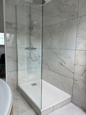 Shower, hair dryer, towels, soap