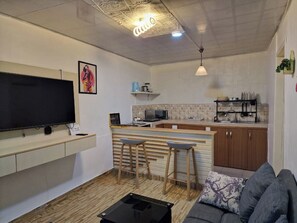 Living area - Blueberry suite 1 with a minimalist touch to make you feel @ home.  (Accra)