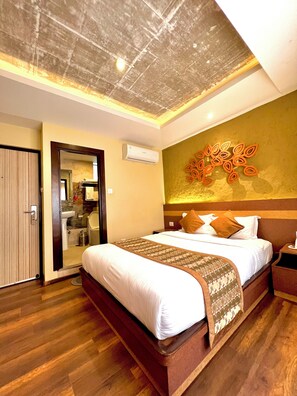 Deluxe Double Room, City View | In-room safe, desk, laptop workspace, blackout drapes