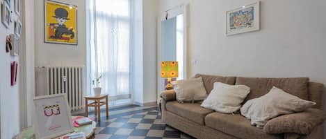 Apartment | Living area | 30-inch flat-screen TV with digital channels
