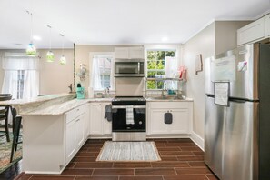 Fridge, microwave, oven, stovetop - Newly renovated Victorian home with beautiful features in quiet neighborhood. (Montgomery)