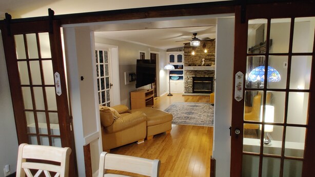A living room with a sofa, a television, and a fireplace. - RANCH WITH CACTUSES  Weekly/Monthly UP TO 50% OFF (Millsboro)