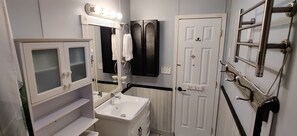 Shower, eco-friendly toiletries, towels, soap