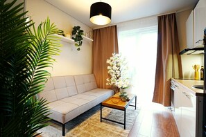 Standard Apartment, Multiple Beds, Air conditioning | Living area