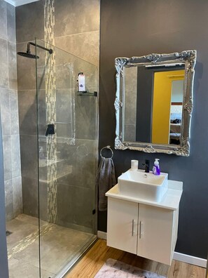 Shower, towels, soap, shampoo