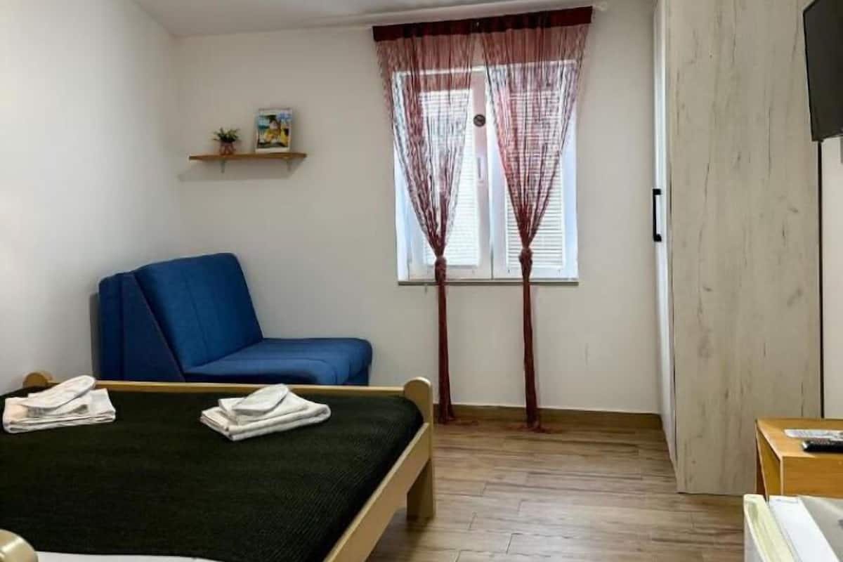 Standaard kamer, uitzicht op tuin | 1 slaapkamer, een minibar, een kluis op de kamer, geluiddichte muren