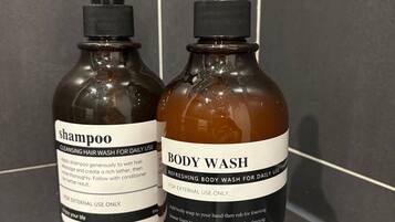 Hair dryer, towels, soap, shampoo