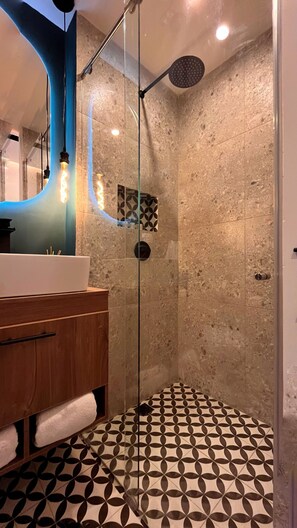 Shower, towels, soap, shampoo