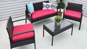 A rooftop patio with wicker furniture and a view of a city skyline. - City views roof deck 4B/4B -10 mins to city centre

 (Philadelphia)