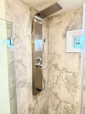 Hair dryer, towels, soap, shampoo