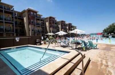 Spacious Waterfront Corner Condo at Bridges Bay with 6 daily waterpark passes.