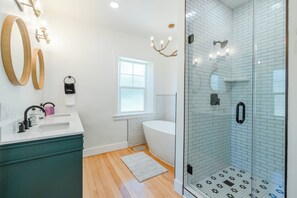 Shower, hair dryer, towels, soap - New Remodel · Main Floor Master · Soaking Tub · Stocked Kitchen · Private Yard (Spanish Fork)