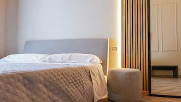 Quarto quádruplo luxo, sacada, vista para a cidade | Camas Select Comfort, frigobar (abastecido com itens grátis)