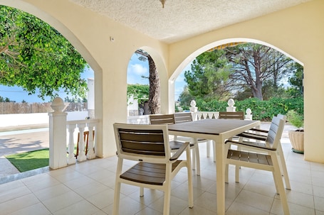 Outdoor dining. Holiday Home 'Can Manya' with Private Pool, Private Terrace and Private Garden