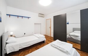 2 quartos, Wi-Fi de cortesia, roupa de cama