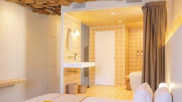 Deluxe Room, Balcony, City View | Minibar, in-room safe, individually decorated, individually furnished