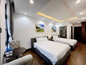 Desk, blackout curtains, iron/ironing board, bed sheets - Legacy Grand World Phu Quoc Hotel  (Phu Quoc)