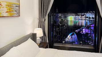 Panoramic Double Room, City View | Desk, blackout drapes, iron/ironing board, bed sheets