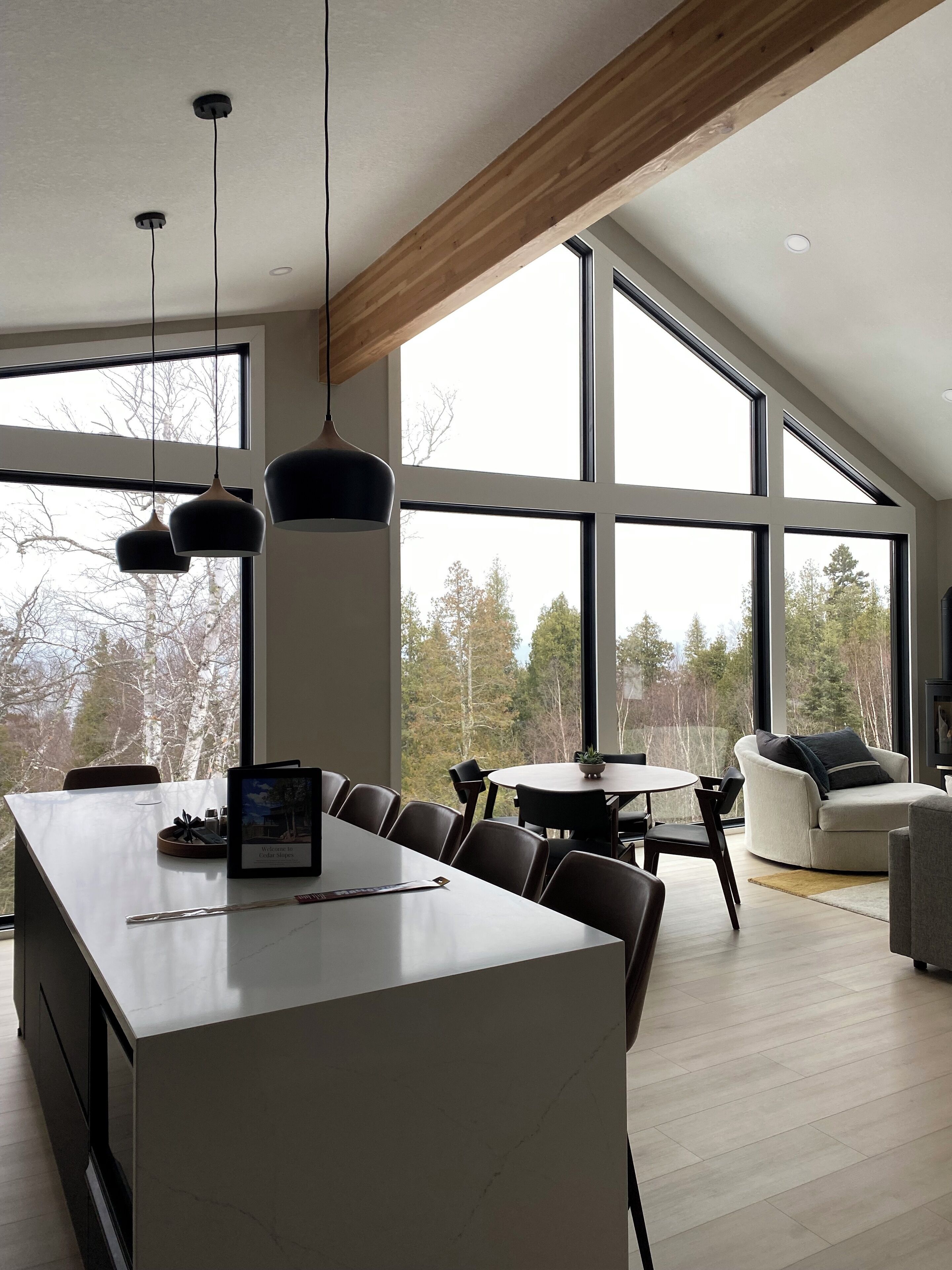 Floor to ceiling windows with views of Lake Superior.