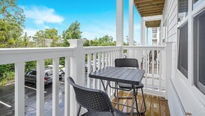 Outdoor dining - No Cleaning Fee! Brand New Double Queen Studio Condo w/ Waterfront Pool + Beach (Southport)