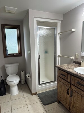 Shower, hair dryer, towels, soap