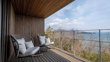 Kamar Twin Deluks, 2 Tempat Tidur Double, Bebas Asap Rokok, pemandangan laut | Teras/patio