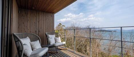 Deluxe Twin Room, 2 Double Beds, Non Smoking, Sea View | Terrace/patio