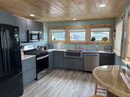 North Sandy Pond Lakehouse with dock and hot tub