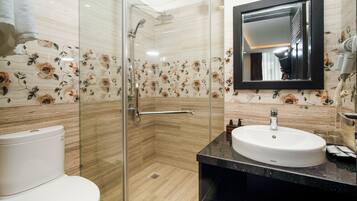 Shower, free toiletries, hair dryer, towels