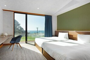 Relax in a spacious room with a large bed, wooden headboard, and a window offering a view of the outdoors.