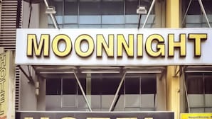 A hotel named 'MOONNIGHT' with a prominent sign. - Moon Night Hotel (Batu Caves)