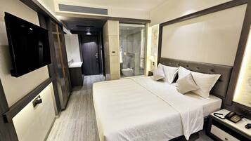 Premium Room, City View | Down duvets, desk, laptop workspace, blackout curtains