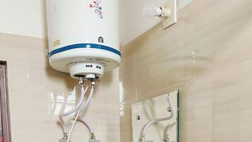 Shower, rainfall showerhead, towels, soap
