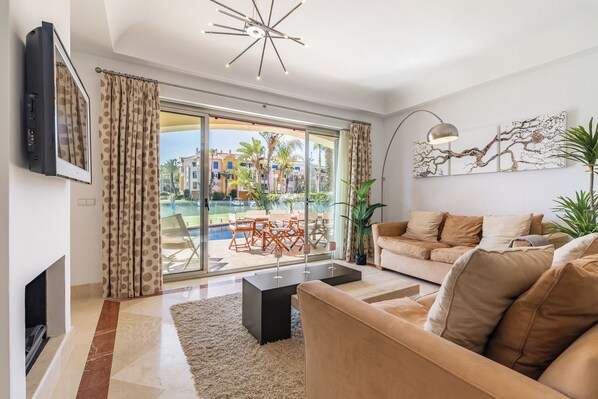 Living area - Waterside marina view 3 bedroom apartment with private pool in Puerto Sotogrande (San Roque)