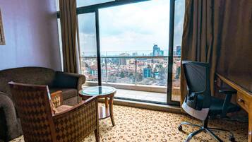 Superior Double Room | Living area | 42-inch flat-screen TV with digital channels