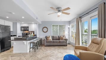 Signature Condo, 2 Bedrooms, Balcony | Living room | 52-inch Smart TV with digital channels