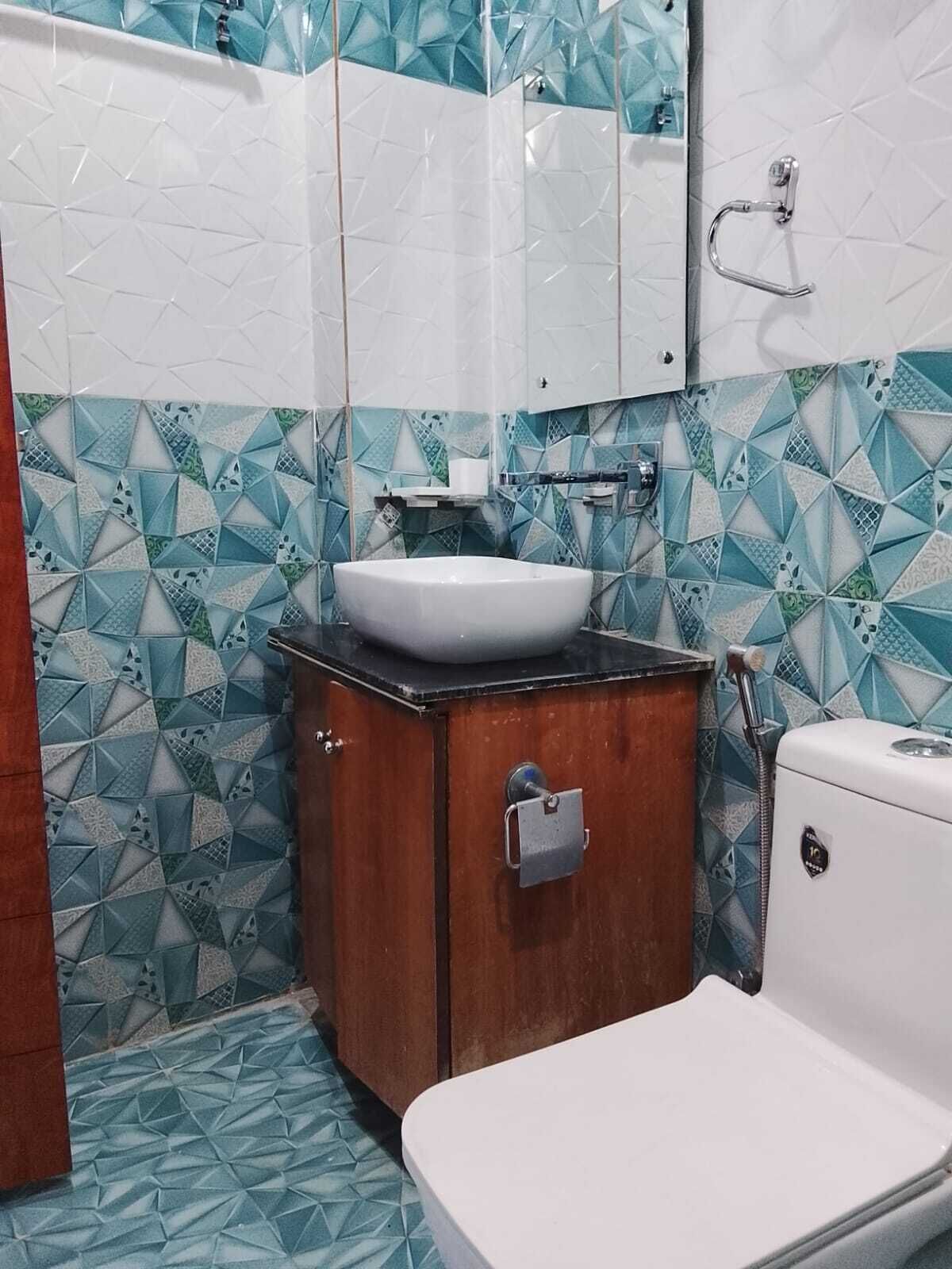 Shower, rainfall showerhead, towels, soap