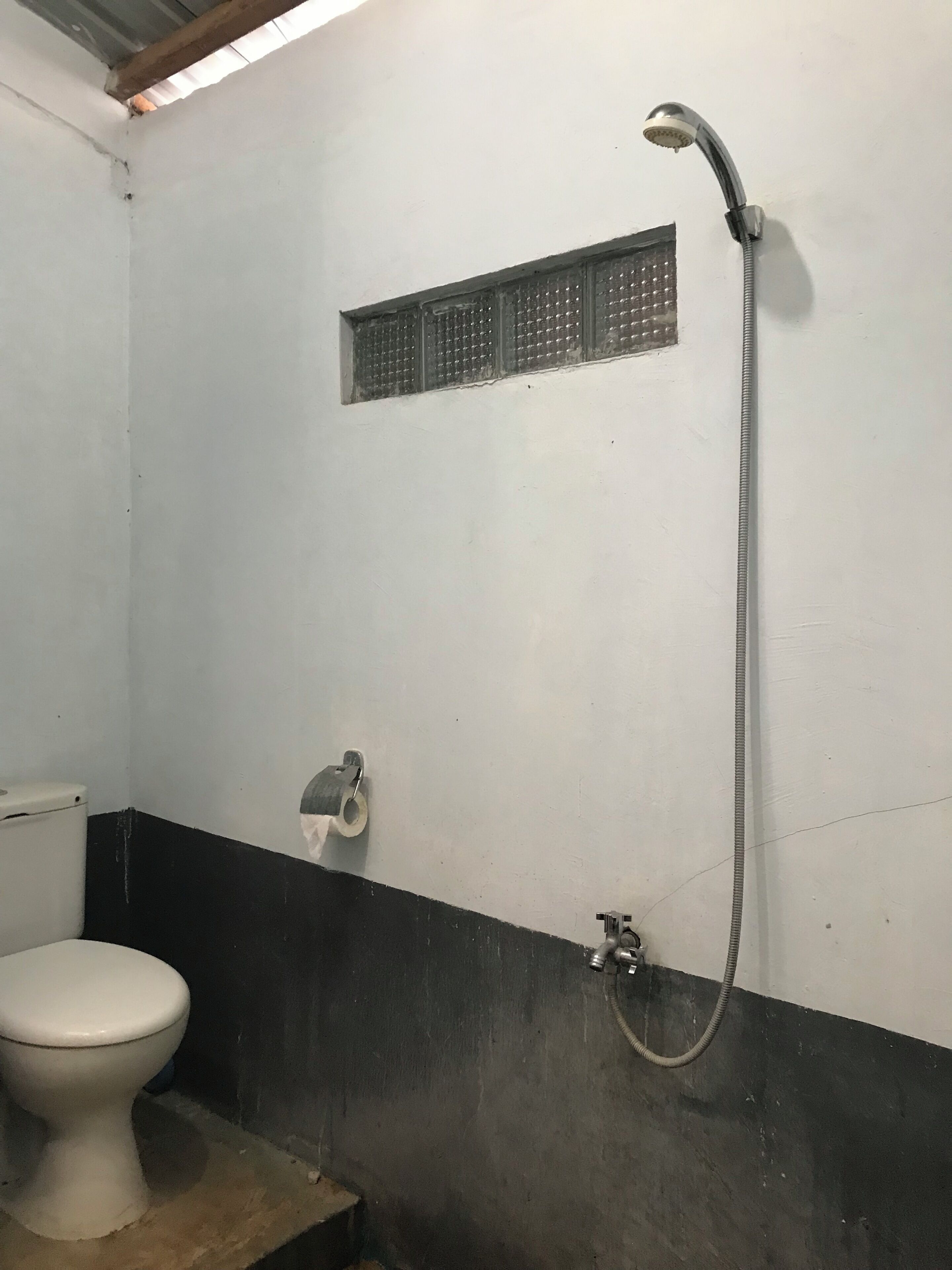 Family Twin Room, Garden View | Bathroom | Rainfall showerhead, free toiletries, bidet, towels