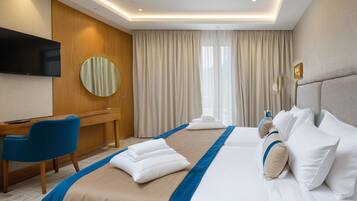 Ropa de cama de alta calidad y minibar