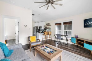 TV, offices - Coastal Comfort Redefined | Shem Creek Bungalow (Mount Pleasant)