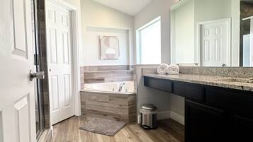 Shower, towels, soap, toilet paper