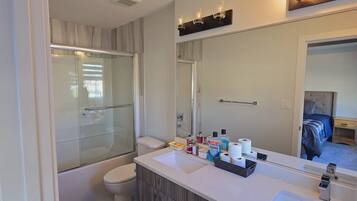 Hair dryer, towels, soap, shampoo