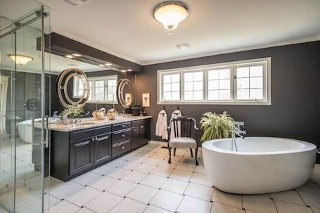 Hair dryer, bathrobes, slippers, towels. Tailwinds B&B