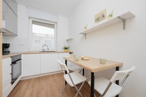 Apartment, 2 Bedrooms, Balcony | Private kitchen | Dishwasher, coffee/tea maker, electric kettle, cookware/dishes/utensils - White Apartment With Parking by Renters (Warsaw)