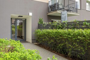 Front of property - White Apartment With Parking by Renters (Warsaw)