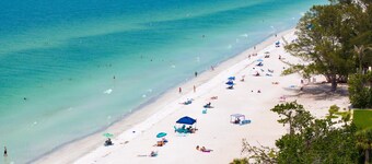 NEW 4 bed 3 bath, heated pool, golf cart block from beach