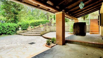 Step into a serene oasis surrounded by lush greenery and natural beauty.